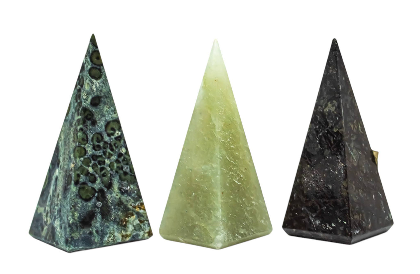 Three pyramid-shaped stones with different patterns on a white background