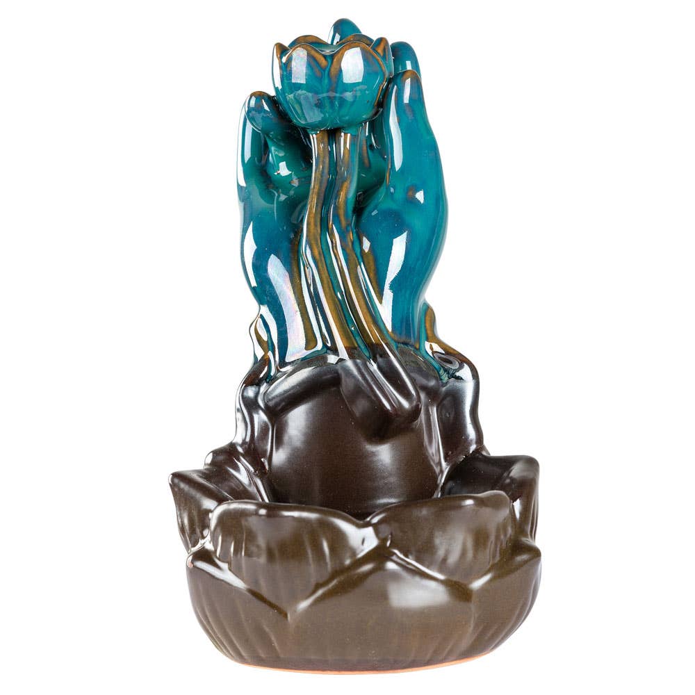 LARGE HAND HOLDING A LOTUS 6" CONE BURNER