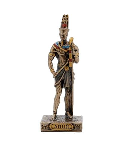 Statue of a figure with ornate clothing and headdress on a white background