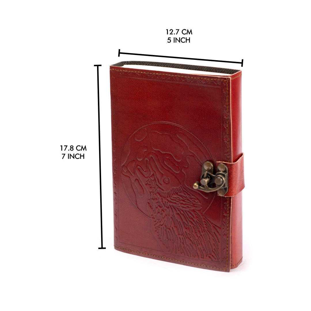 Red leather journal with wolf design and measurements on a white background