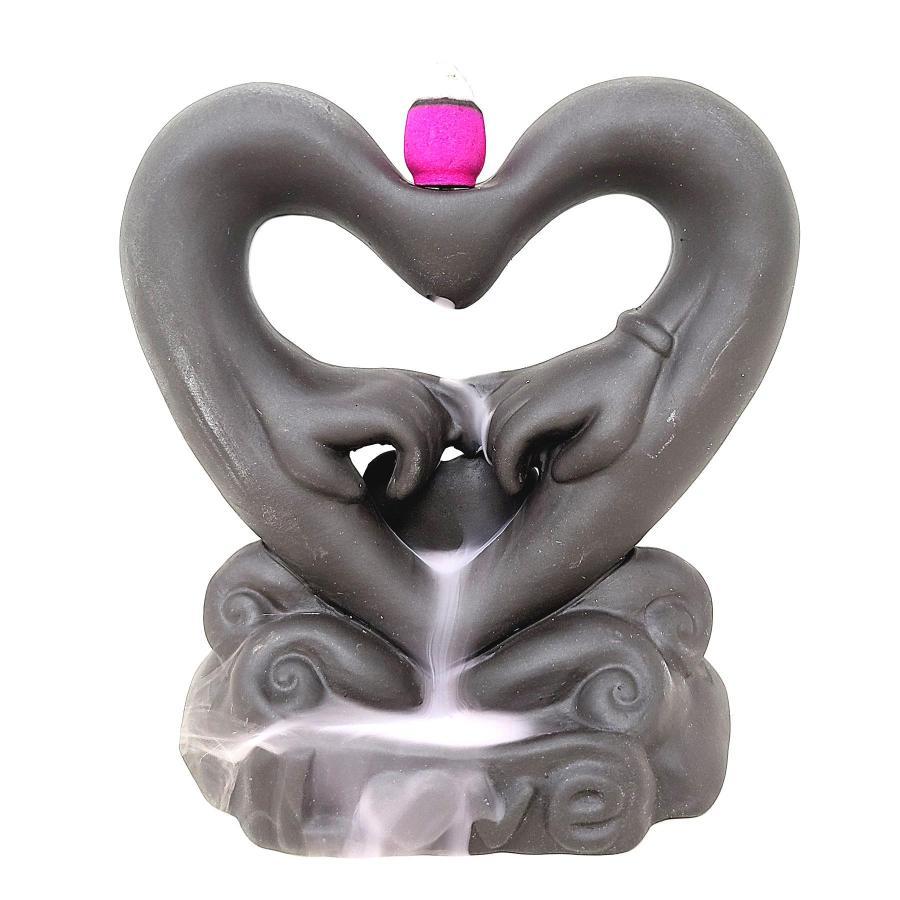 Hand Holding in Heart Backflow Incense Burner