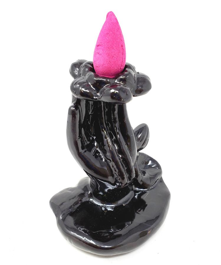 Hand Holding Lotus Backflow Incense Burner