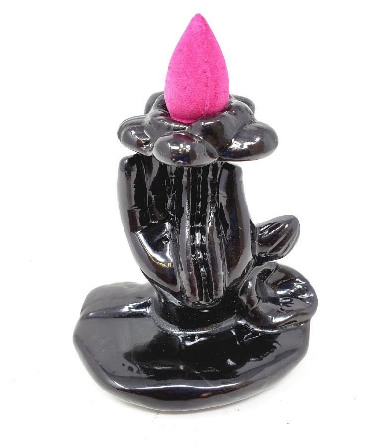 Hand Holding Lotus Backflow Incense Burner