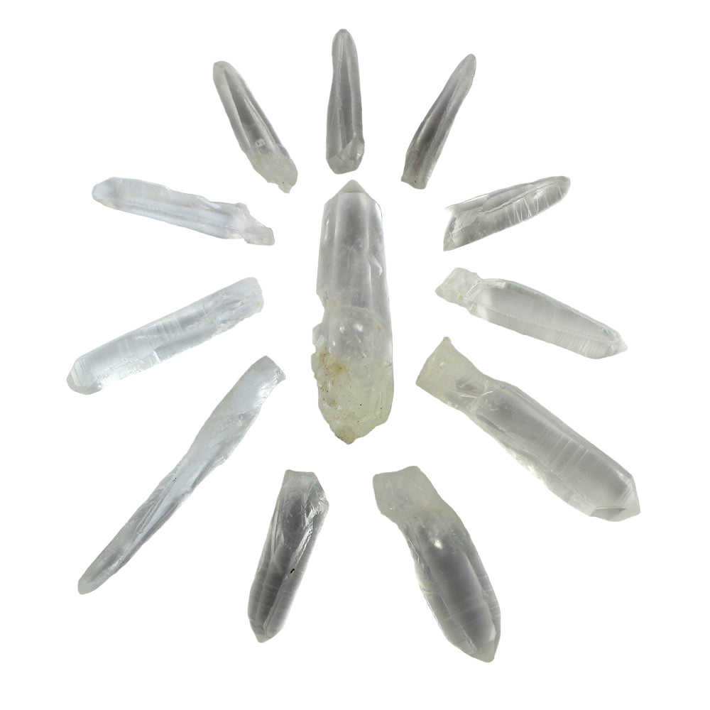 Clear crystal points arranged in a circular pattern on a white background