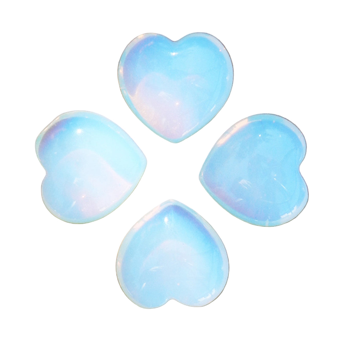 Four heart-shaped opalite stones on a white background